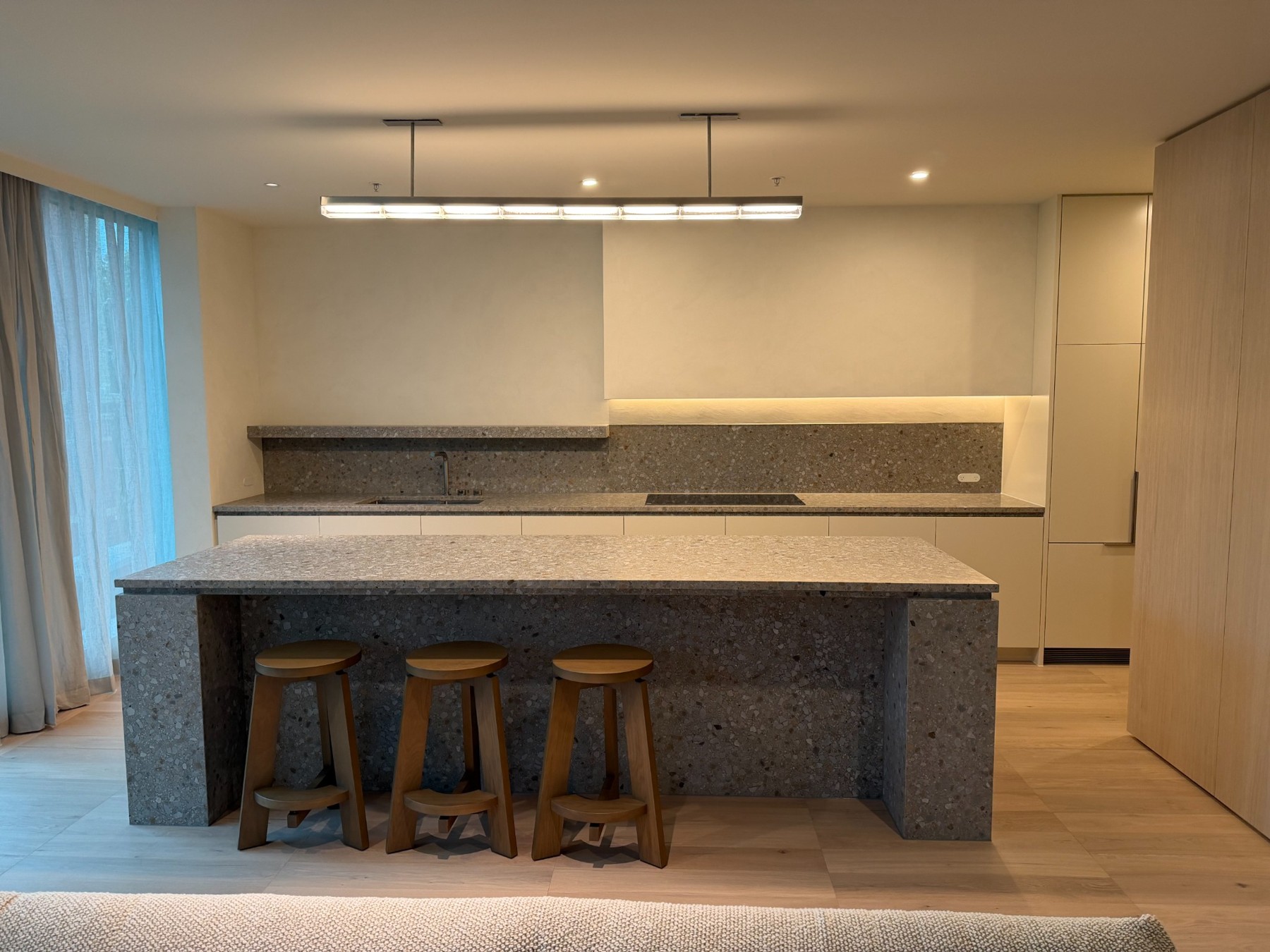 Prahran display suite kitchen with a stone island